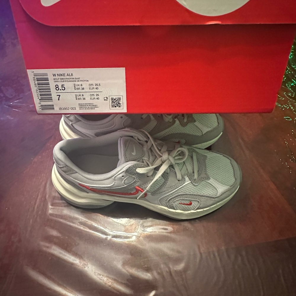 Nike Gray Sneakers with Red Details